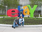 Greg and Beth pose in front of the eBay sign