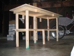 The hanging 2x3's in the back will be used to attach the workbench to the wall